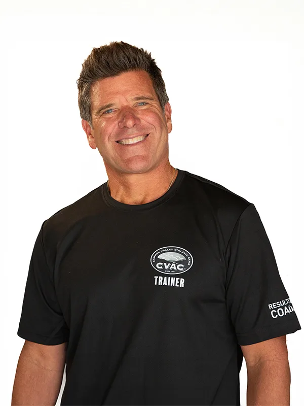 Brandon Brandon, Personal Trainer, smiles on a white background