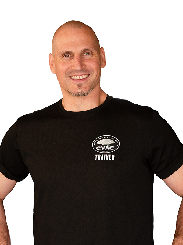 Antonion Headshot Antonio, Personal Trainer, smiling with a white background.