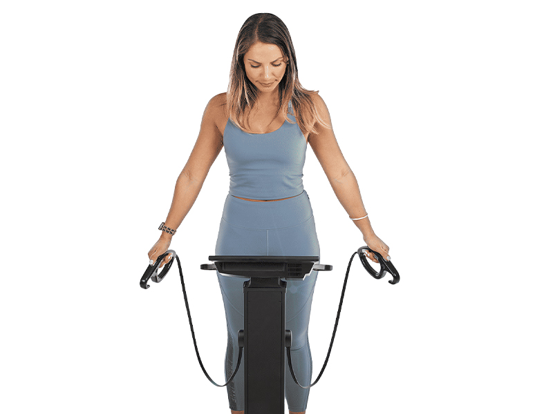 Photo of a woman using the Evolt 360, body composition scanner.
